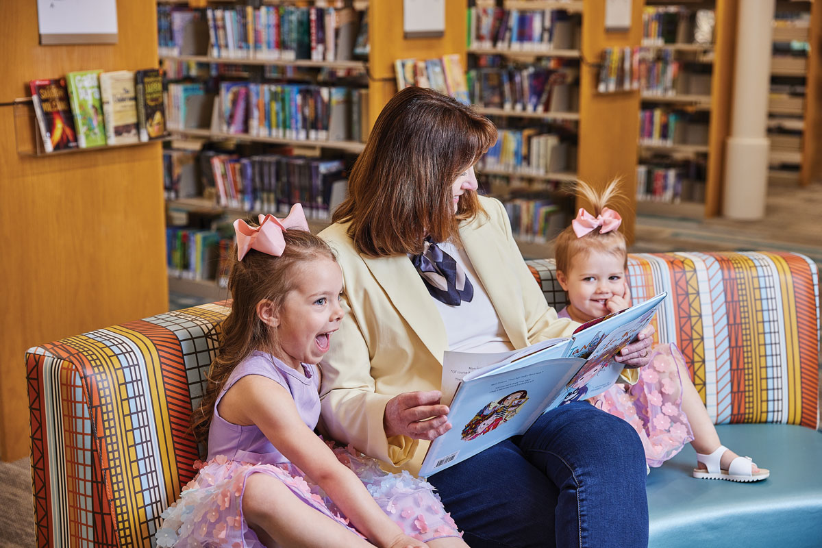 Loretta Ellsworth reads her new book to her granddaughters, Ella Brownell (4) and Harper Brownell (2).