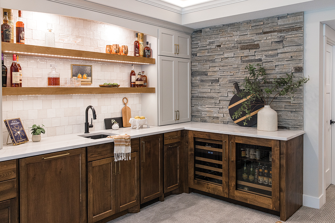 Open shelves in the bar area highlight a few bottles from Adam Stranik’s bourbon collection.