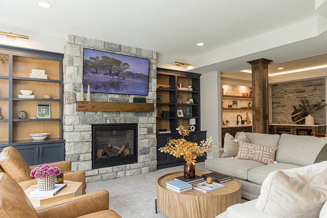 The Stranik family wanted a cozy basement for family time and entertaining. Designer Stephanie Goldfarb created different zones to meet their needs.