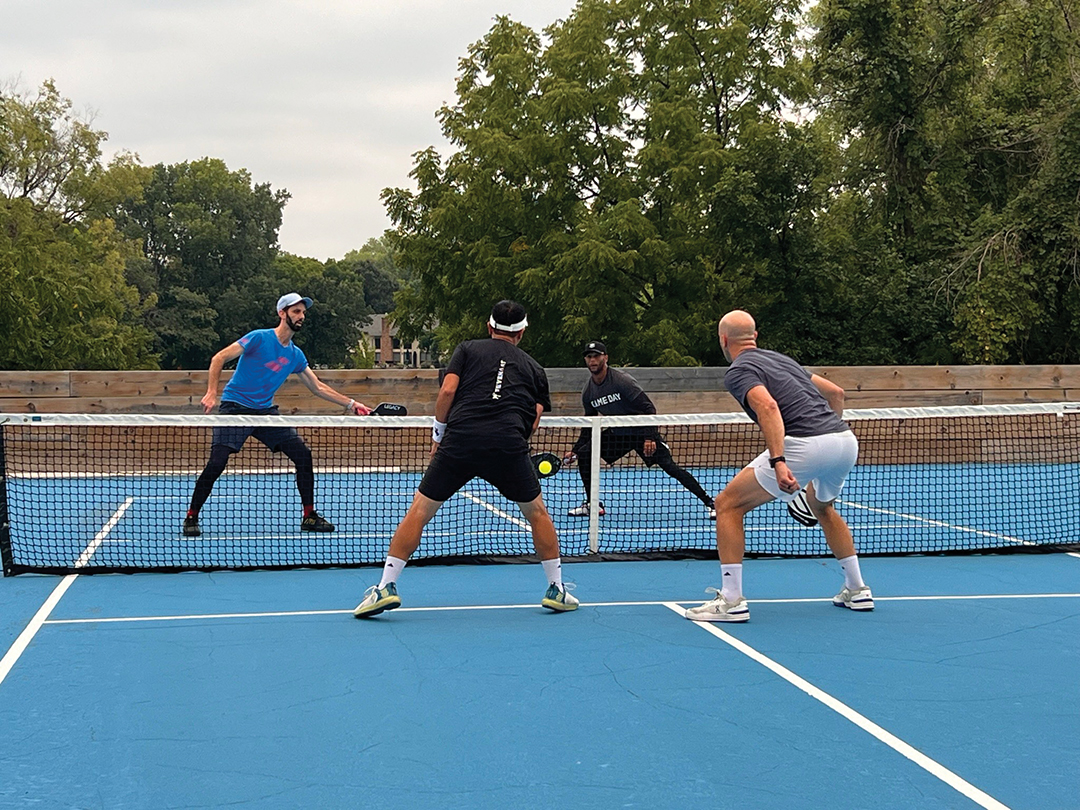 A pickleball game at a local park.