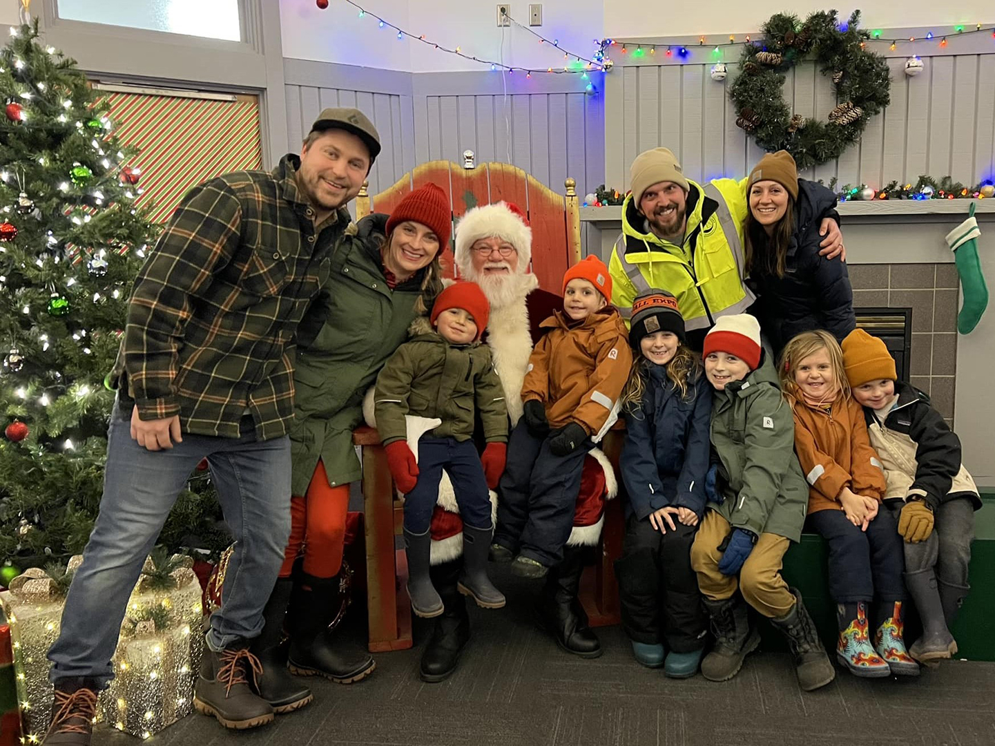 DecemBRRR Dazzle Santa Posing with Family