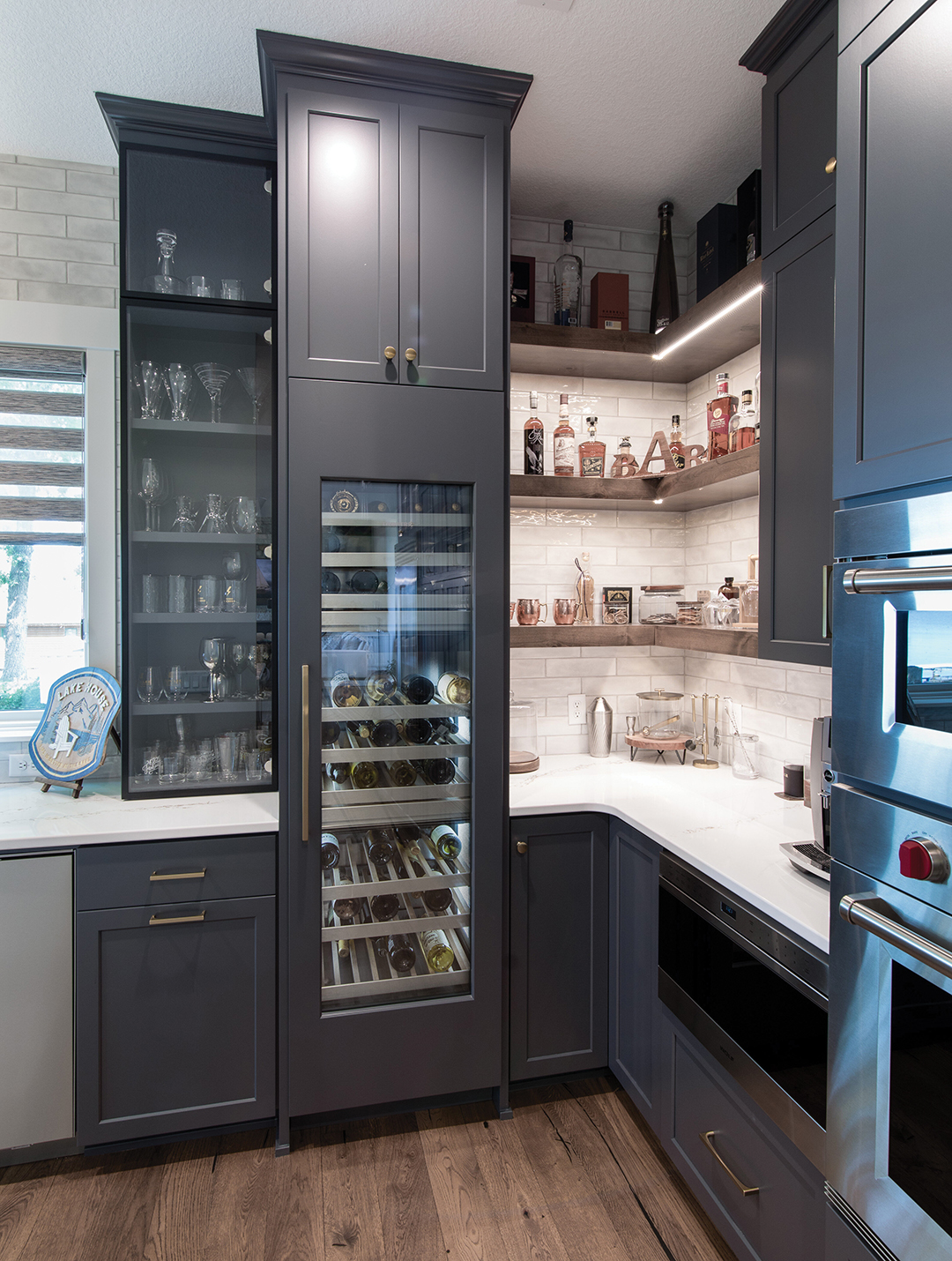 The scullery (also known as a working kitchen) is tucked behind the main kitchen.