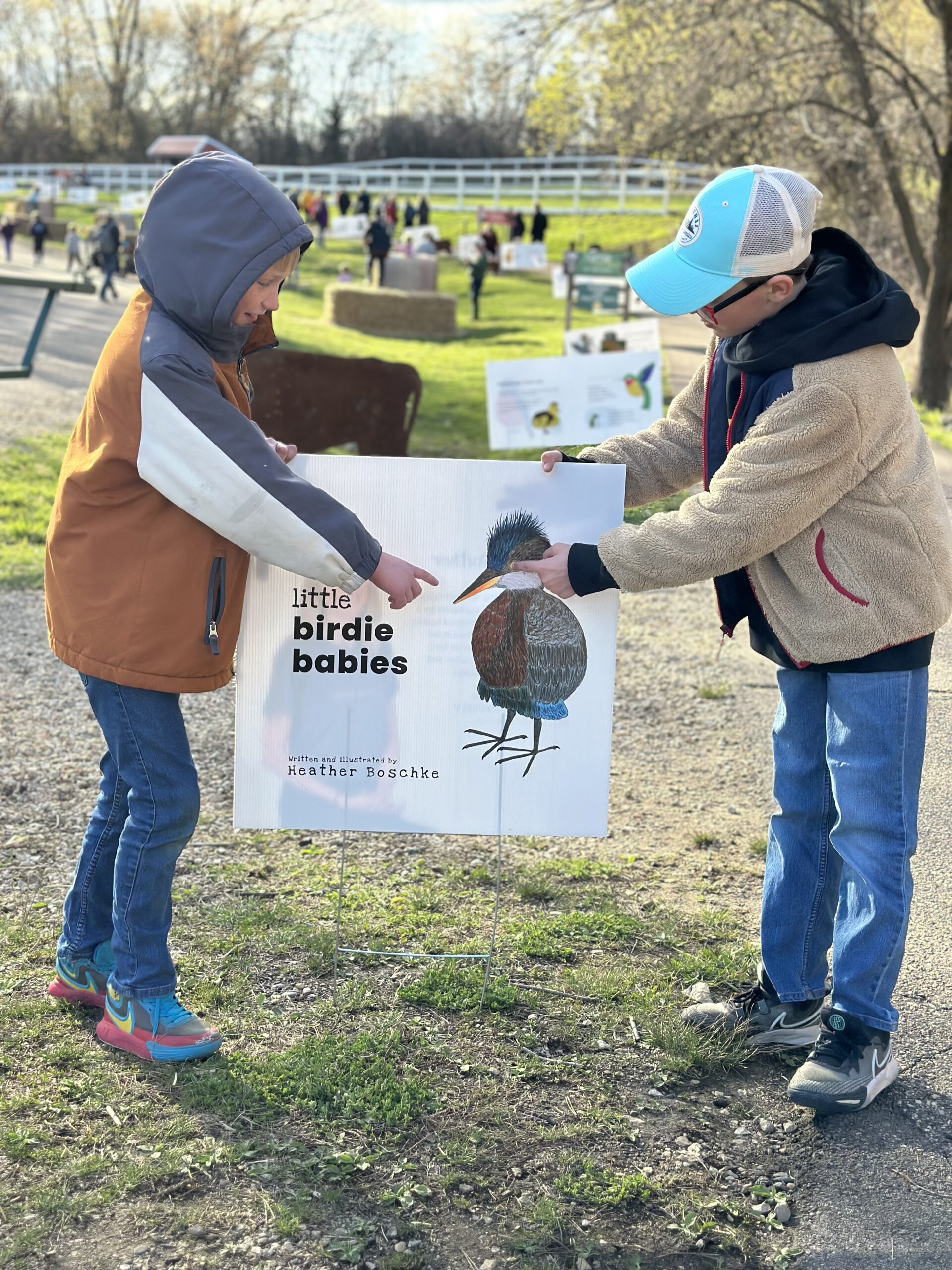 The Farm Babies Book Walk features pages from author and illustrator Heather Boschke's children's book Little Birdie Babies.