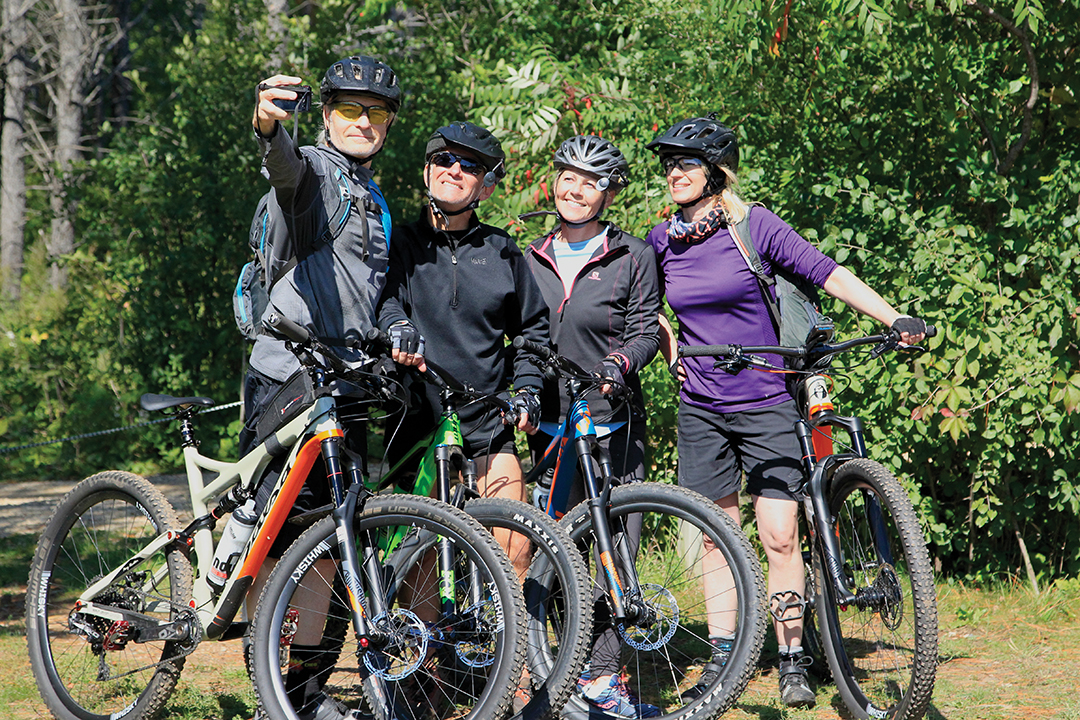 Bikers stop for a selfie at the Wild Ride Mountain Bike Festival at Lebanon Hills Regional Park.
