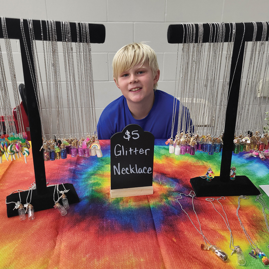 Mason Deppe’s booth at the Youth Art and Craft Market in 2024. 