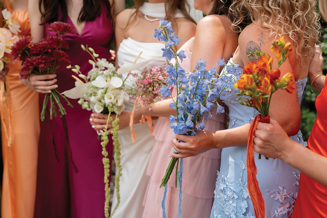 Alayna Lotto asked her bridesmaids to select whatever color they wanted for their dresses, and they carried bouquets customized to match their outfits. Many of their dresses were thrifted or borrowed.