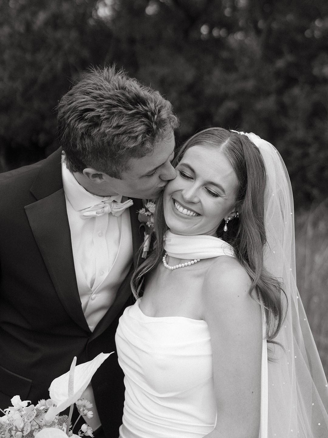 The couple incorporated meaningful pieces aiming for an elegant, timeless wedding. Bride Alayna Lotto wore pearls, her birthstone, and incorporated them into some decor elements as well, and her earrings were the same ones that her mother had worn for her own wedding.